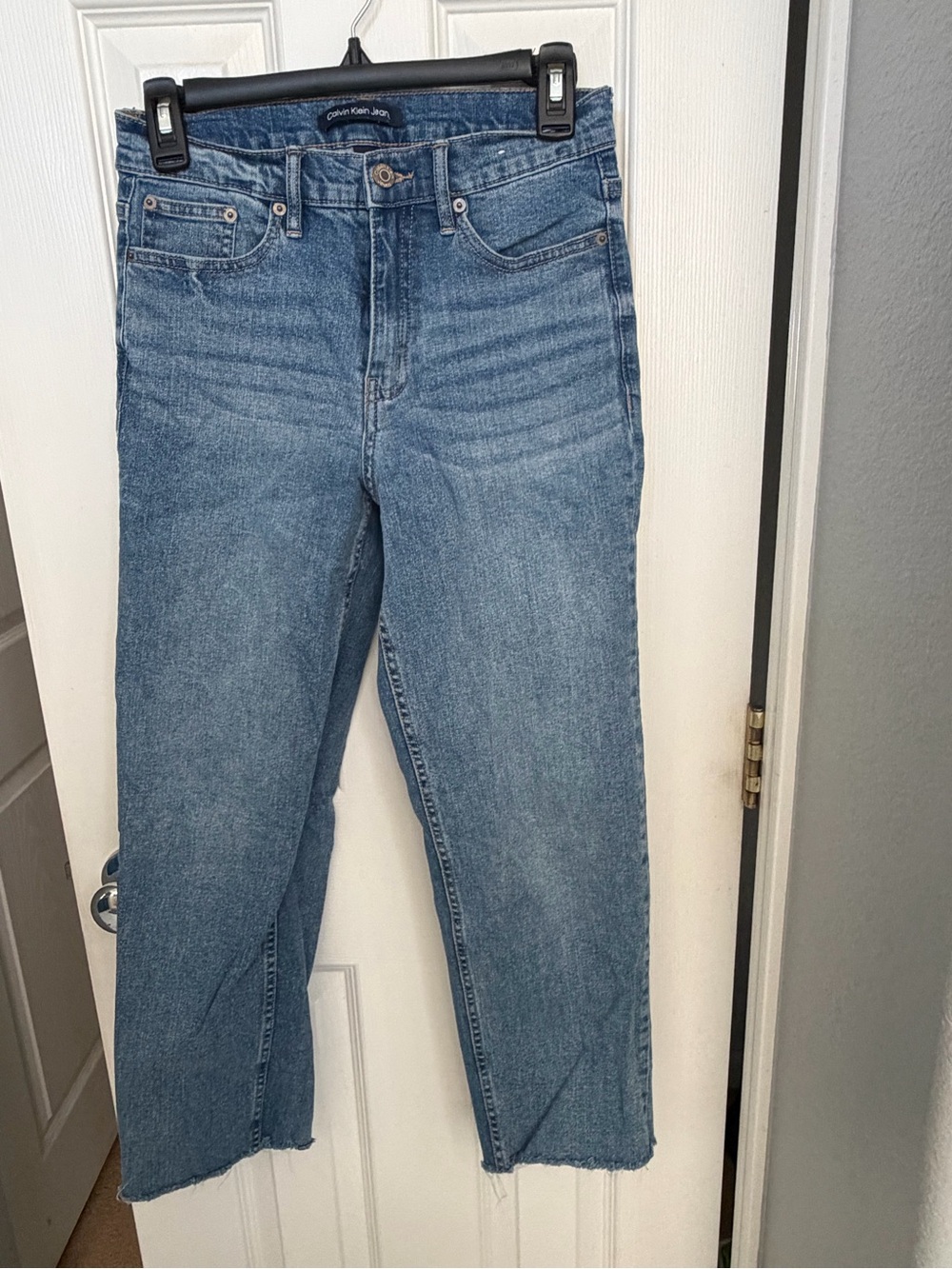 Calvin Klein Blue Denim Jeans with Brown Leather Patch